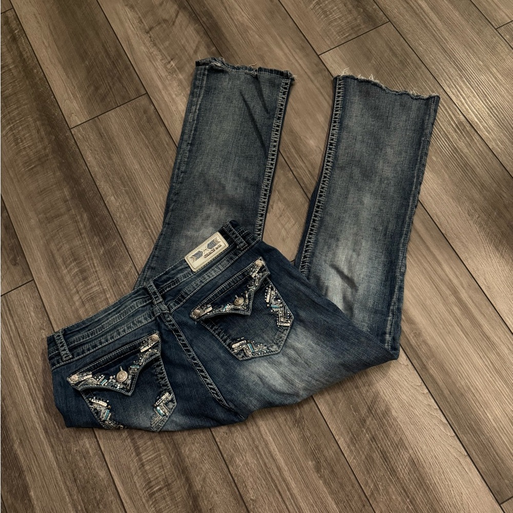 Grace in La blue easy fit jeans with boho detailing